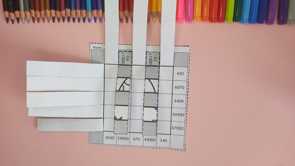 Paper weave tutorial: Put down the 2nd and 4th column strips. 