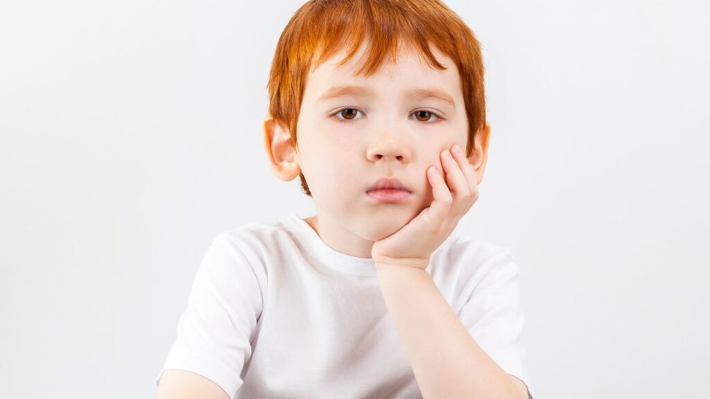 How to help distracted students - a boy hold his chin